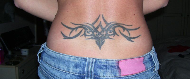 20 Awesome Lower Back Tribal Tattoos