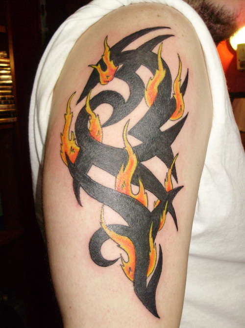 23 Wonderful Tribal Fire and Flame Tattoo