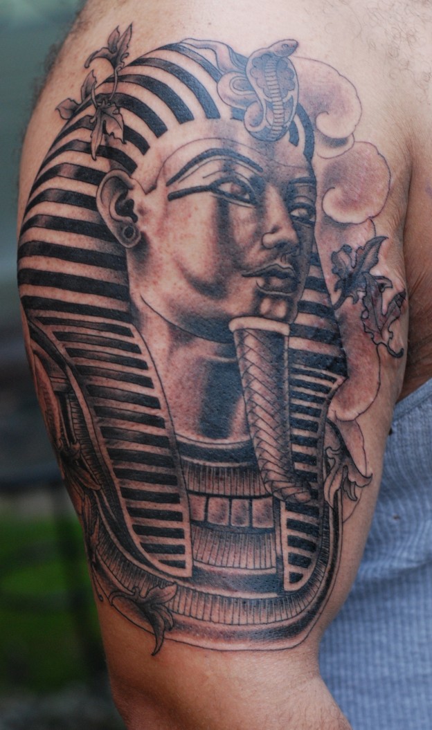 Fine line female pharaoh tattoo on the inner arm