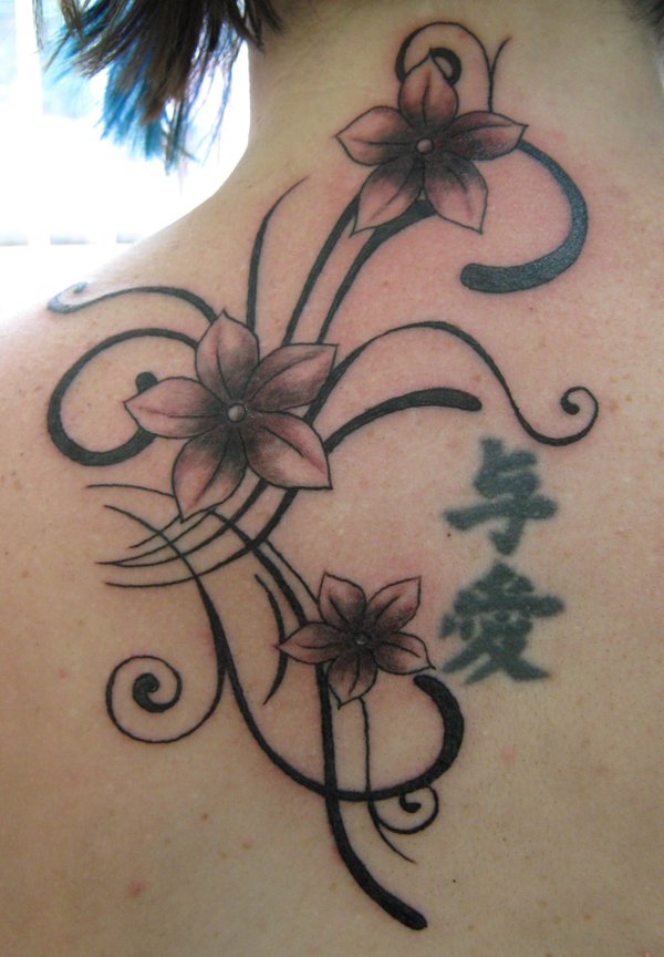 22 Amazing Tribal Flower Tattoos