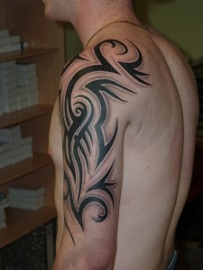 Half Tribal Sleeve Tattoos