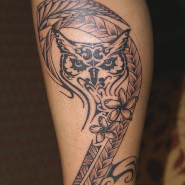 tribal owl arm tattoos