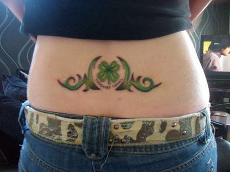 Ogham tattoo on the upper back reading Clann meaning Offspring  progeny children in Irish Gaelic
