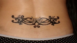 Ladies Lower Back Tribal Tattoos