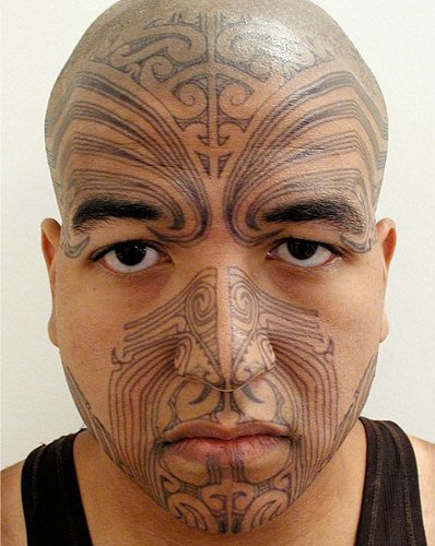 fluidheron208 tribal face tattoo gray messy hair clean shaven