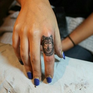 Small Tribal Wolf Tattoos