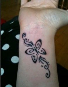 Tribal Butterfly Tattoo on Wrist