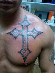 Tribal Cross Chest Tattoos