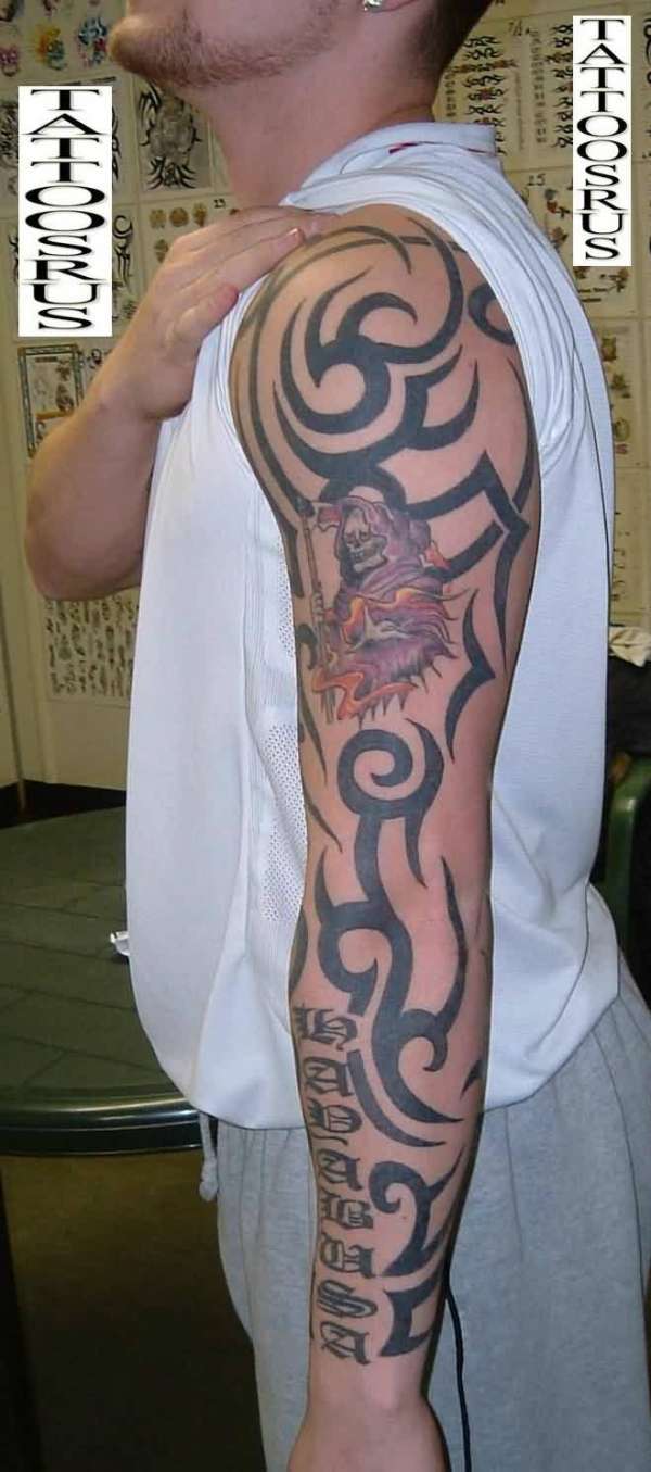 tribal full arm tattoo