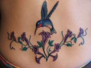 Tribal Hummingbird with Flower Tattoo