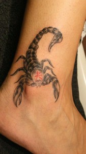 Tribal Scorpion Tattoo on Leg