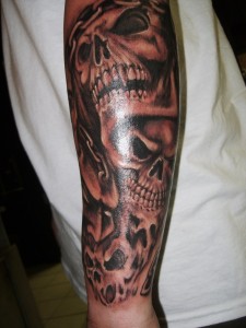 Tribal Skull Sleeve Tattoos