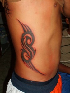 Tribal Tattoos on Rib Cage