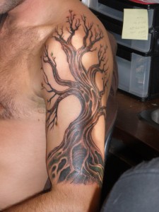 Tribal Tree Sleeve Tattoo