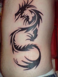 Tribal Dragon Tattoo on Ribs