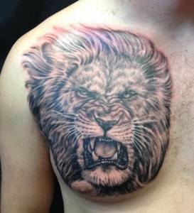 Tribal Lion Tattoo on Chest